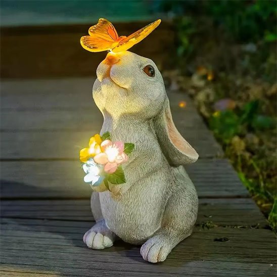 Statue de jardin lapin heureux