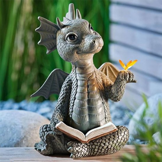 Statue jardin mignon petit dragon qui lit un livre