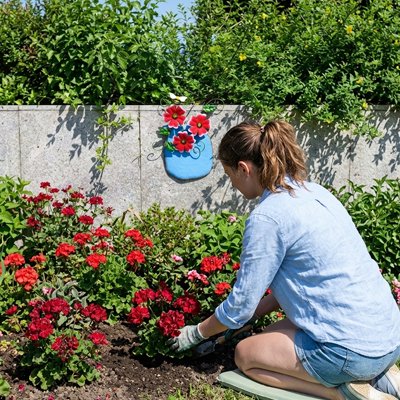 Déco mural de jardin sur une clôture