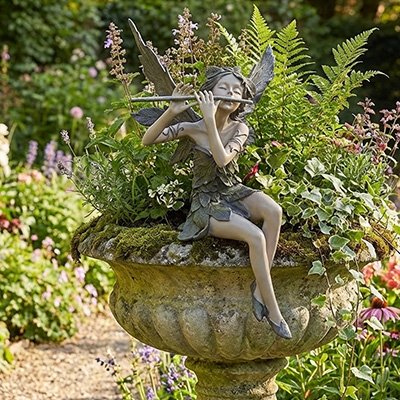 statue de jardin fée joue de la flute