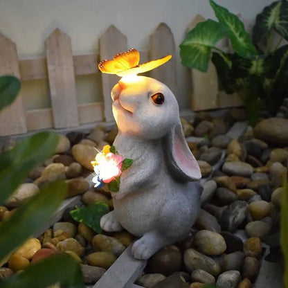 Statue de jardin lapin papillon