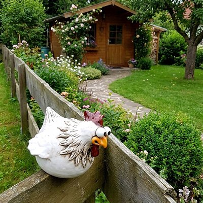 Statue jardin poulet qui regarde