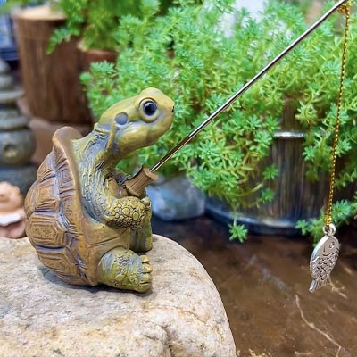 Statue de jardin tortue à la pêche