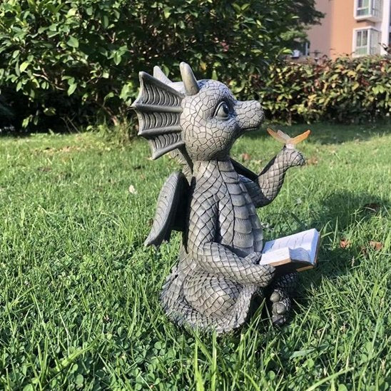 Statue jardin petit dragon qui lit un livre